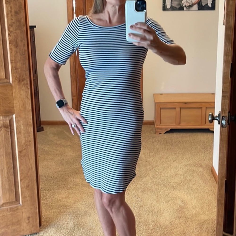 Form fitting striped dress.